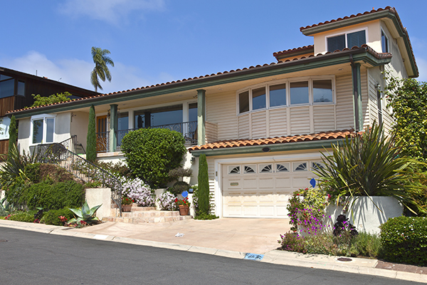 Image: What is a soft story retrofit - showing a house with a living space over a garage
