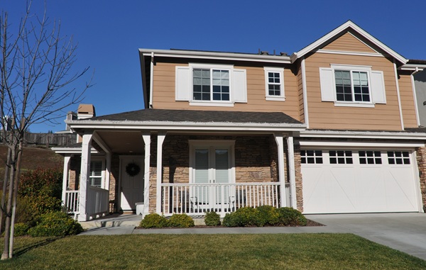 Image: Houses built with one or more floors of living space over a garage attached to the house are vulnerable to damage from earthquakes because the walls and door(s) are not often reinforced for shaking